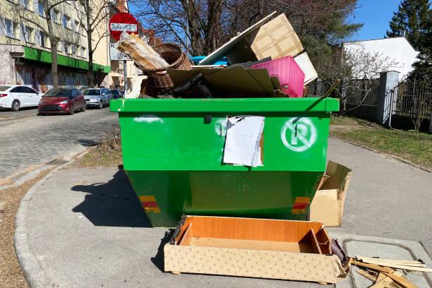istock A metal container overflowing with waste. close-up 1401903478