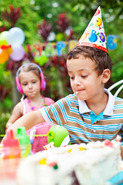 istock Child eting on a Birthday party 1401903620