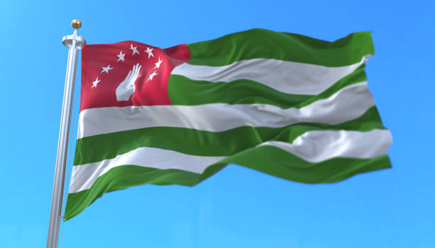 istock Abkhazian flag waving at wind with blue sky, loop 1401904530