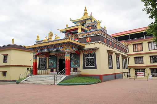 An Isometric picture of the famous Tibetan temple decorated with vibrant colors dedicated to Lord Buddha in Bylakuppe, Coorg, India.