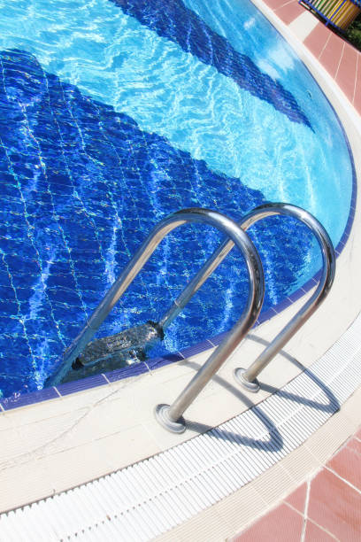 istock Swimming pool and stairs 1401912264