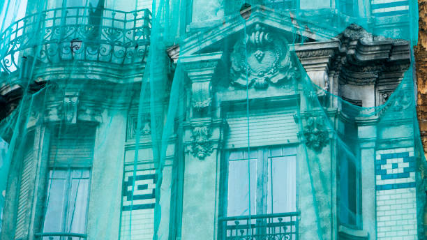 Antique building covered in protection canvas