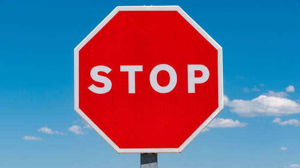 istock Stop signal in rural road 1401915508