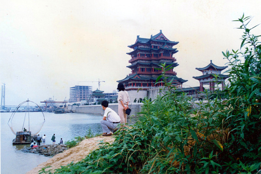 Tengwang Pavilion(or Pavilion of Prince Teng),one of the three famous towers in South China.Adjacent to it is the Ganjiang River.Film photo in May 06 1996,Nanchang,Jiangxi