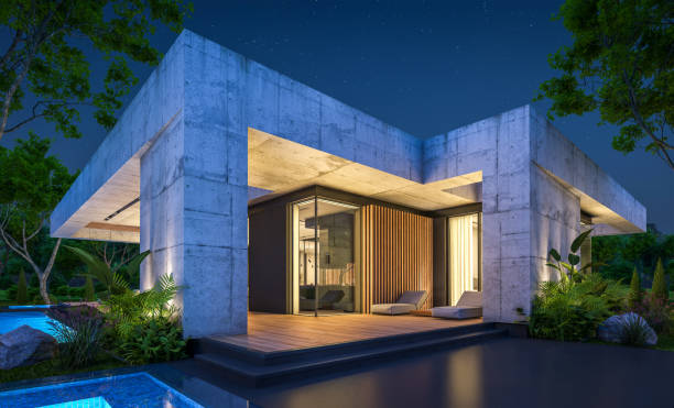 istock 3d rendering of new concrete house in modern style in night 1401919948