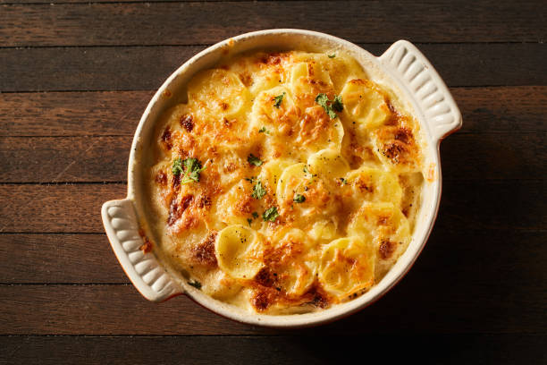 istock Homemade gratin baked potato in baking dish 1401921567