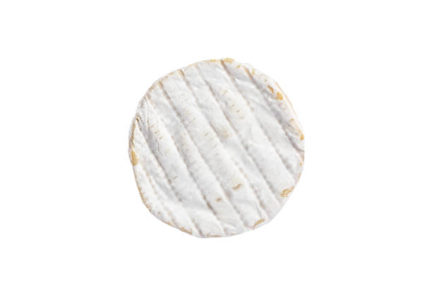 istock White soft Brie cheese. Camembert isolated on white background, top view. Round dairy product. 1401923976