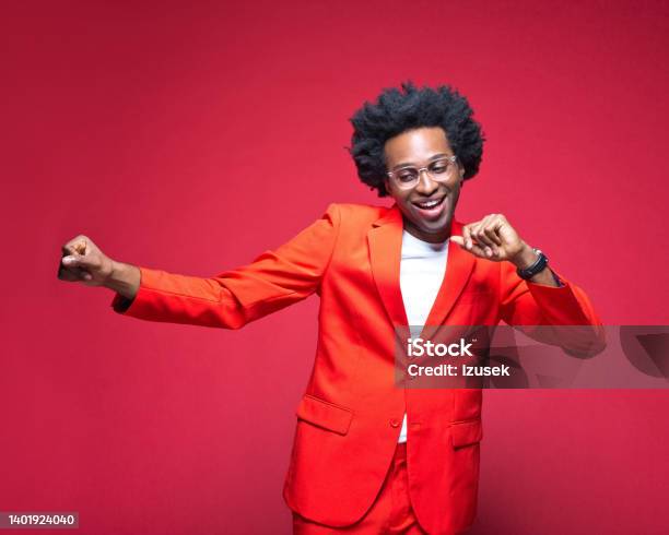 Businessman In Red Blazer Enjoying While Dancing Stock Photo - Download Image Now - African-American Ethnicity, Males, Red Background