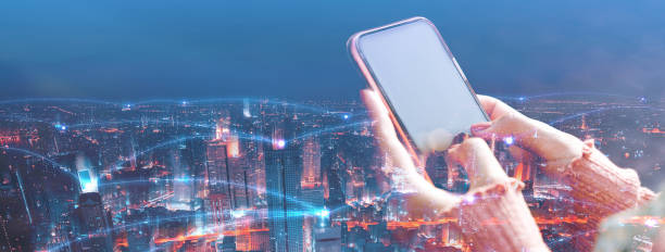 istock Double exposure digital network city with woman hand using smart phone 1401924050