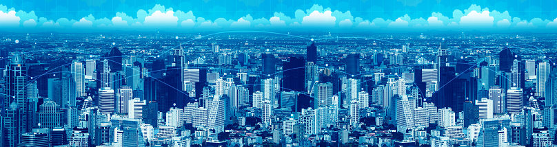 Manipulated cyber city with digital network line for data connect technology concept. Blue visual theme color with pixel sky and grid banner size background.