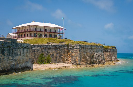 View from between the stone walls of Fort Frederick, an old Caribbean fort, to the mountains below.