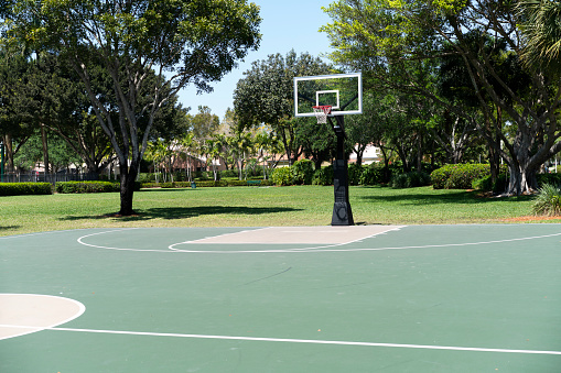 Empty basket hoop at outdoor court