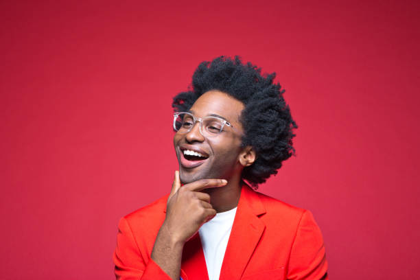 istock Happy businessman with hand on chin 1401927533