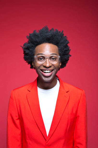 istock Smiling businessman in red blazer 1401929018