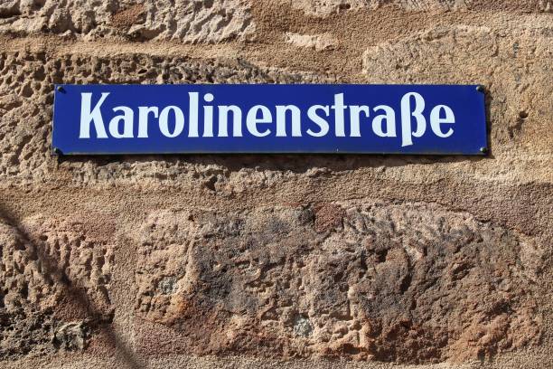 Nurnberg street - Karolinenstrasse Nuremberg city, Germany. Sign with street name - Karolinenstrasse. karolinenstrasse stock pictures, royalty-free photos & images