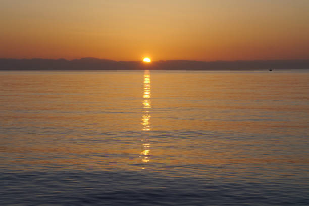 istock Colorful sunrise on the sea 1401929943