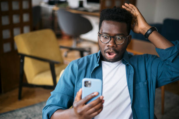 istock Reading about shocking news using a smart phone 1401932478
