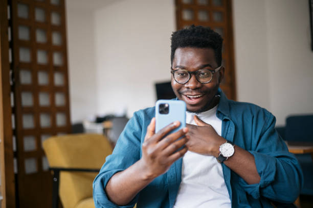 istock Reading good news using a smart phone 1401934373