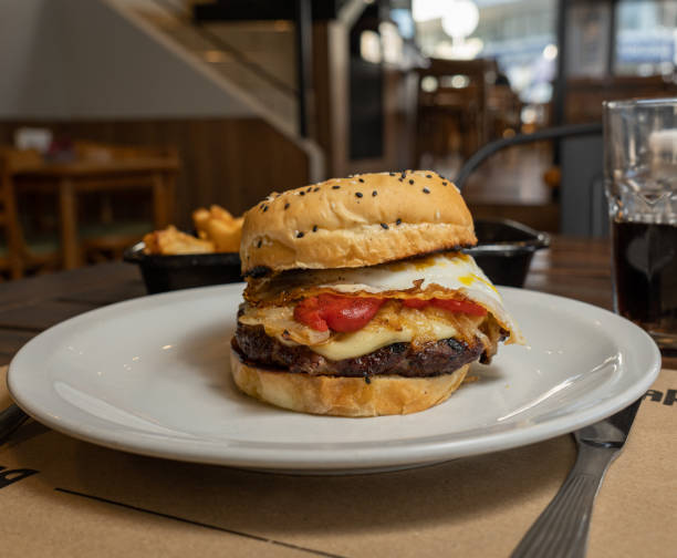 istock a complete burger with french fries 1401935231