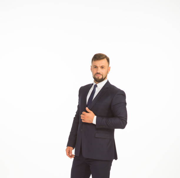 istock young businessman in a suit posing with different emotions on a white background in the studio isolated in full growth 1401935449
