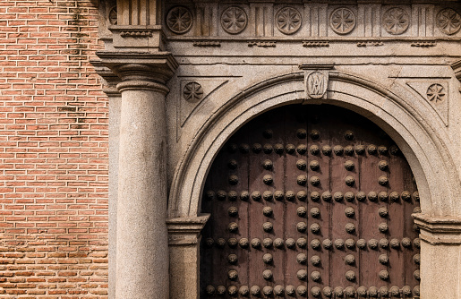 Detail of an old wooden door in Toledo, Spain