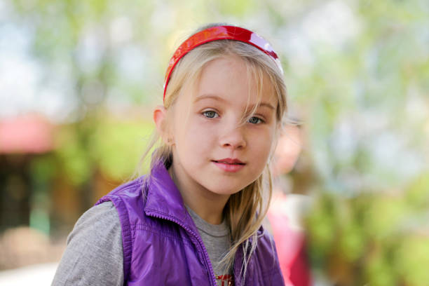 Being natural is more stylish. Cute little fashion model. Little girl of fashion. Fashionable girl child. Small girl with fashion look. Little girl with long blond hair in fashion style, copy space.