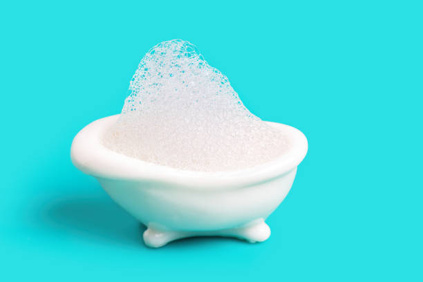 istock Miniature bathtub full of soap bubbles 1401942568