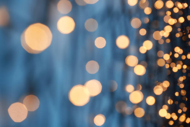 istock Defocused lights abstract bokeh background - blue gold celebration party Christmas 1401942644