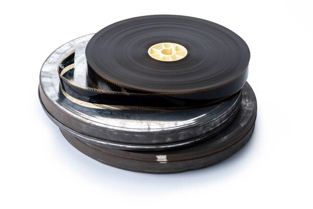Vintage 35 mm Movie Reel with two old cans, isolated on a white background.