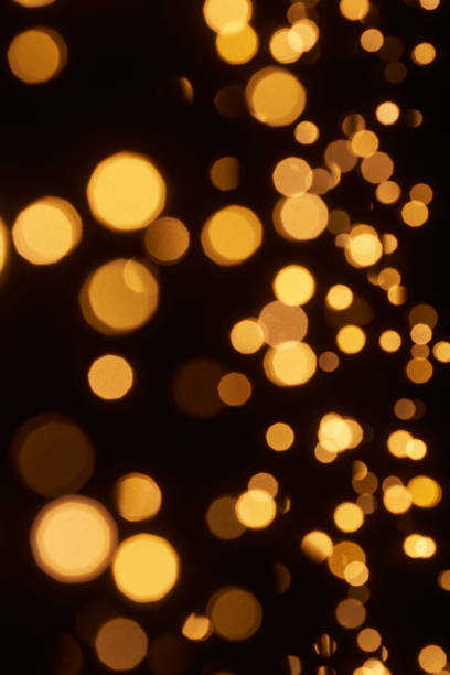 istock Defocused lights abstract bokeh background - black gold celebration party Christmas 1401942705