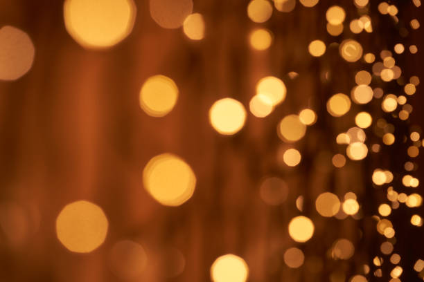 istock Defocused lights abstract bokeh background - orange gold celebration party Christmas 1401942988