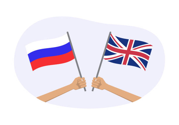 illustrations, cliparts, dessins animés et icônes de drapeaux de la russie et du royaume-uni. symboles nationaux britanniques et russes. main tenant un drapeau agité. illustration vectorielle. - british flag vector uk national flag