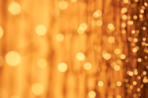 Photography of defocused lights (bokeh) in warm color tones. Great background for Websites, Christmas and many more. Native image size: 7952x5304