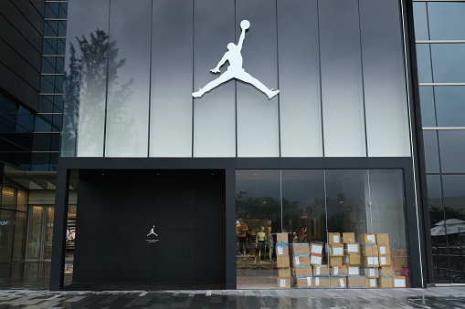 Shanghai,China-June 5th 2022: facade of large Air Jordan flagship retail store with brand logo.