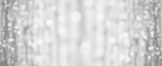 High Key, black and white photography of defocused lights (bokeh). Great background for Websites, Christmas and many more. Native image size: 13000x5304
