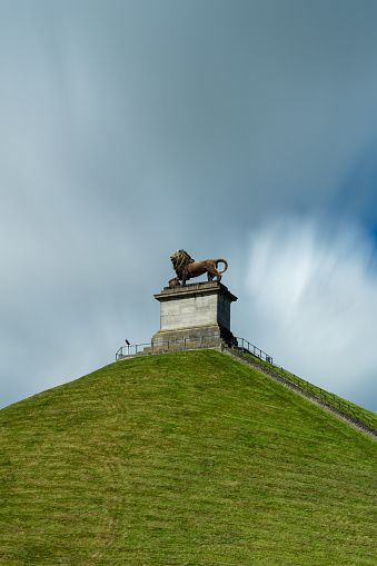 Waterloo, Belgium - 6 June, 2022: vertical view of the Lion's Mound memorial statue and hill in Waterloo