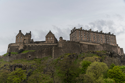 Edinburgh Castle, located on Castle rock, in the center of the city. The castle is one of the oldest fortified sites in Europe and has been a location of a royal residence dating back to the 12th century.