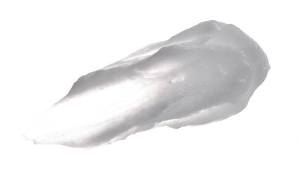 istock White cosmetic cream swipe isolated on white background 1401951838