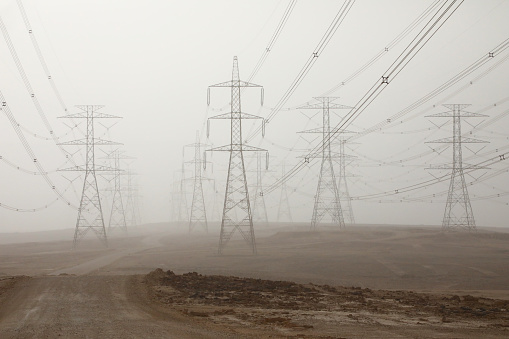 Transmission towers in desert, Saudi Arabia