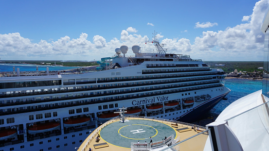 Cozumel, Mexico - May 04, 2022: Carnival Cruise Line, Carnival Valor anchored in Cozumel Port.