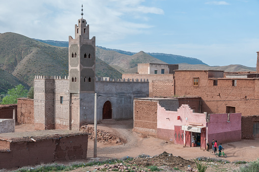 High atlas, Morocco - March 19, 2012: Mountain village and mosque under construction