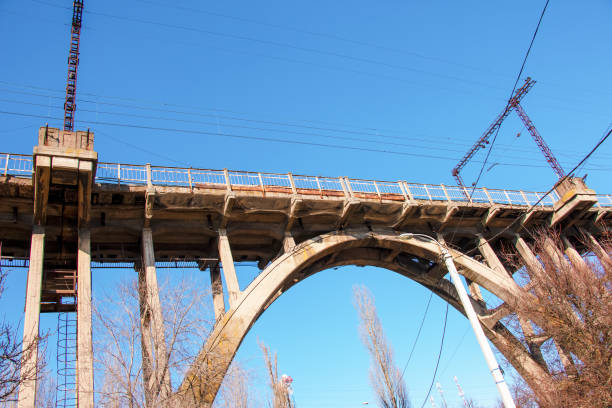 istock Structural elements of the old, built in the USSR, railway bridge across the Dnieper River. 1401958071