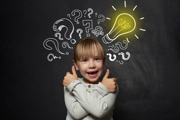 istock Child girl school student with yellow lightbulb. Kid ideas and development concept 1401958174
