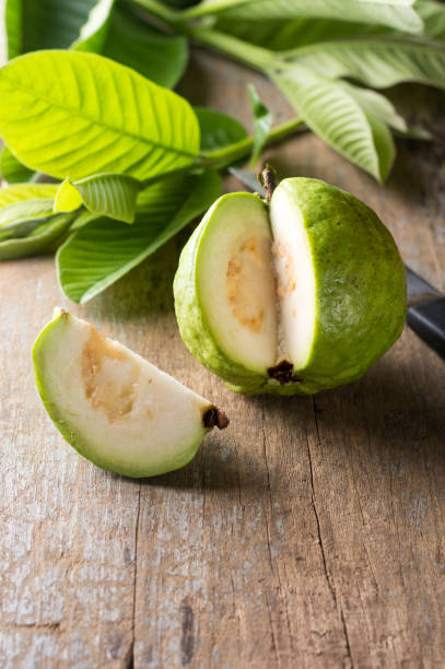 guava sliced on wood table