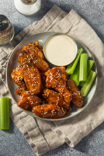 istock Homemade Sriracha Honey Chicken Wings 1401959598