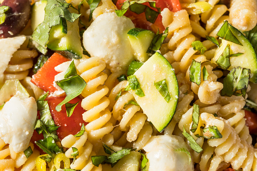 Homemade Summer Fusilli Pasta Salad with Cheese and Vegetables