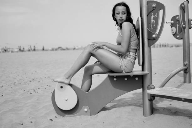 View of a woman with vintage style on the beach
