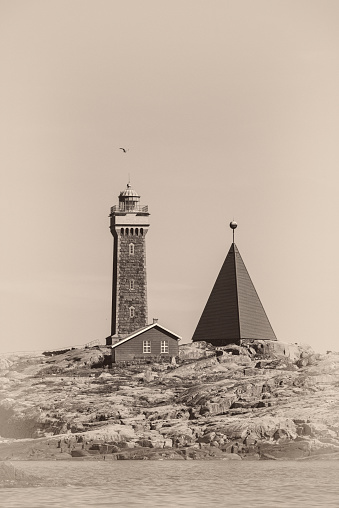 Lighthouse of Vinga in the archipelago of Gothenburg. Image processed to get a vintage look.