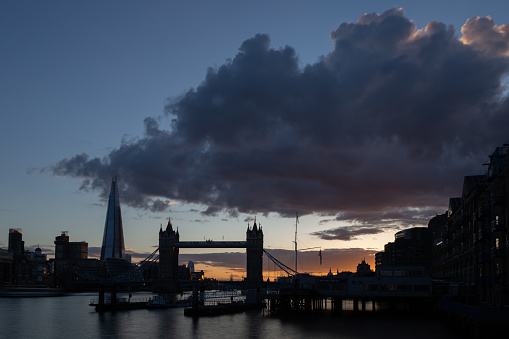 View of Shard and Tower Bridge from Tower Bridge Wharf at sunset