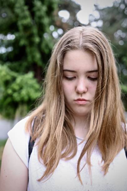 istock Cute girl making sad face 1401962697